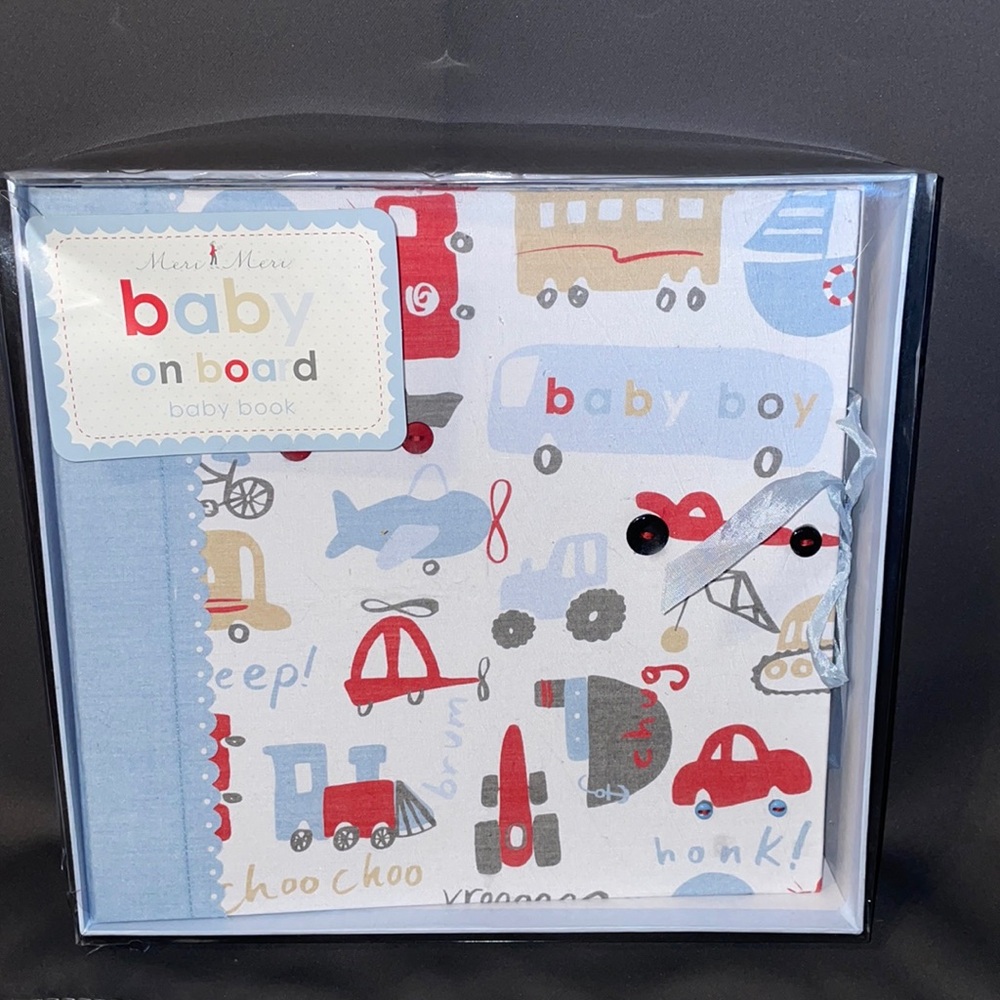 NWT.  Baby Boy binder on board.  11x11”